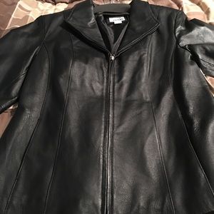 Brand new, with tags, black genuine leather coat.